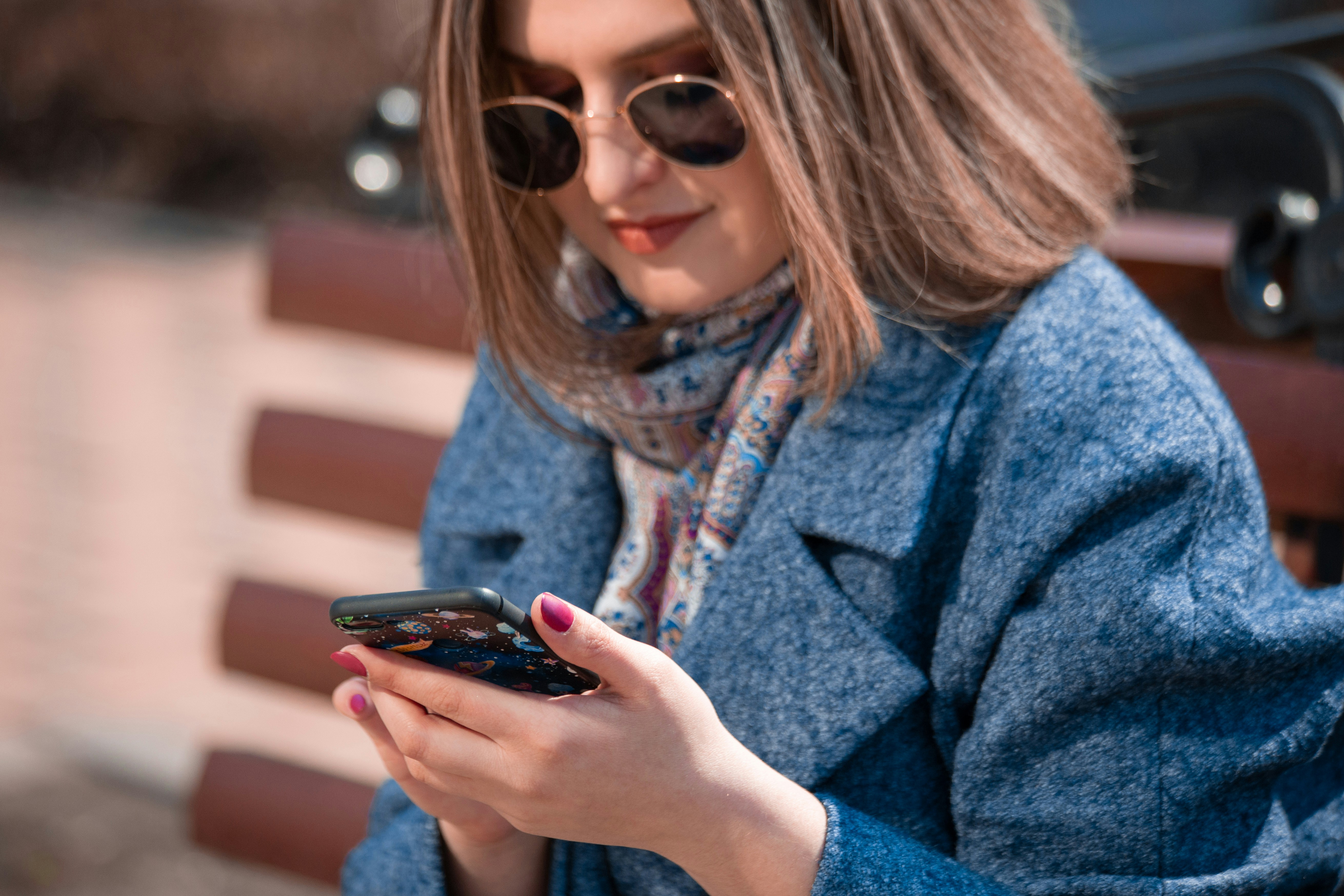 Girl speaking to her mobile phone.